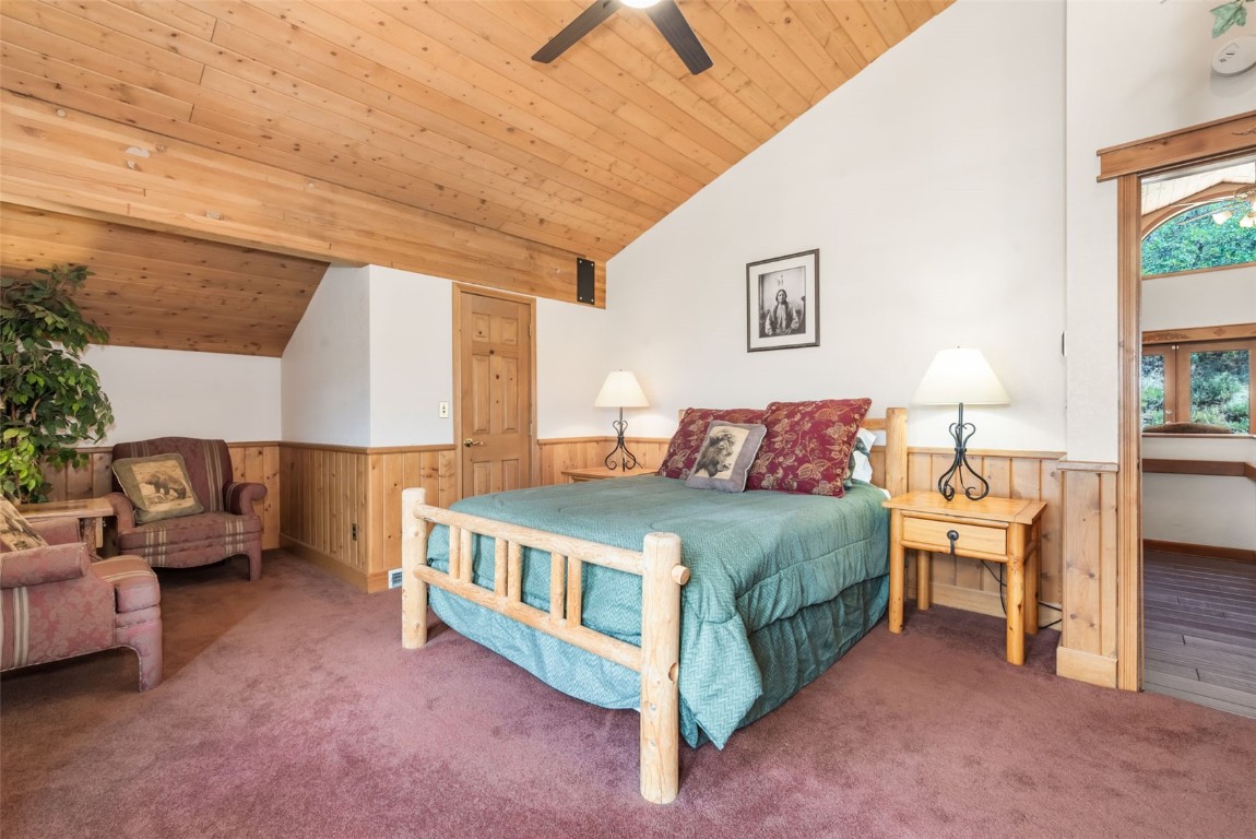 2300 Glacier Ridge Steamboat Springs, CO 80487 - Photo 40 of 50 a bedroom with a bed and a table