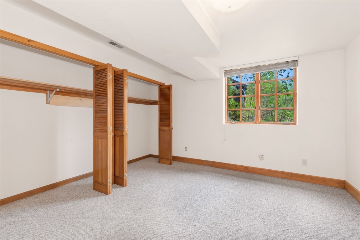 2300 Glacier Ridge Steamboat Springs, CO 80487 - Photo 46 of 50 an empty room with windows