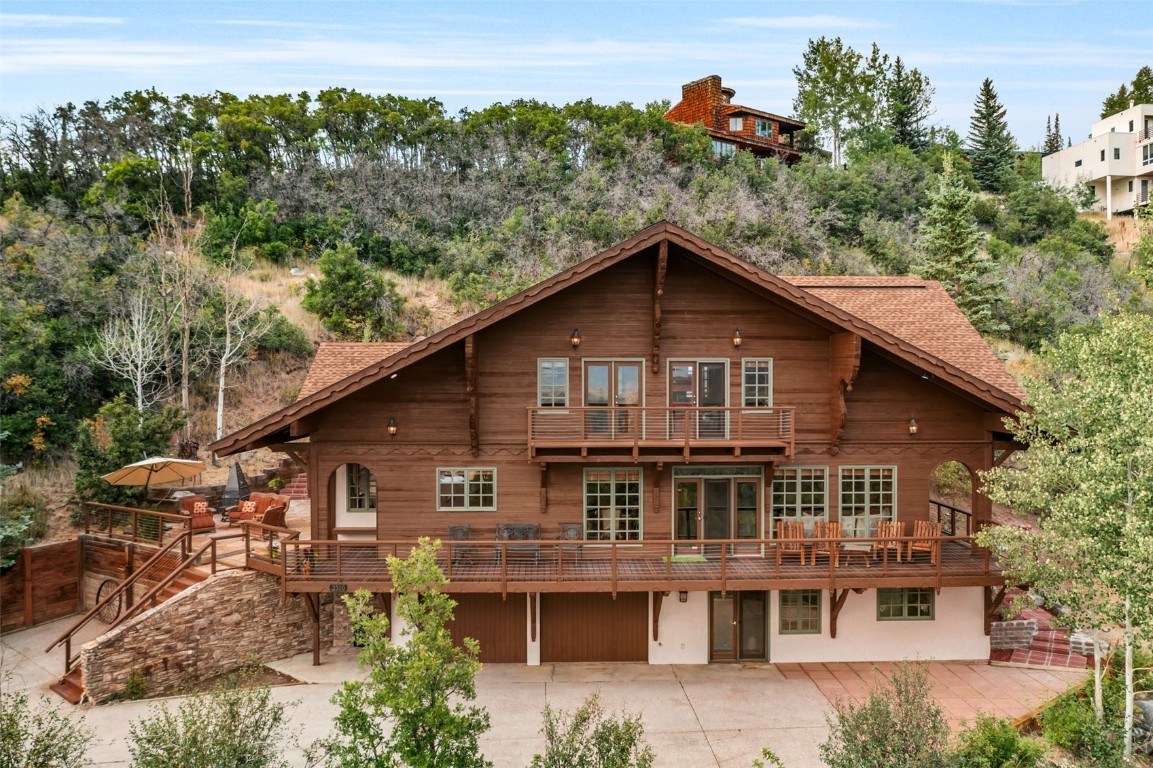 2300 Glacier Ridge Steamboat Springs, CO 80487 - Photo 49 of 50 a front view of a house with a yard