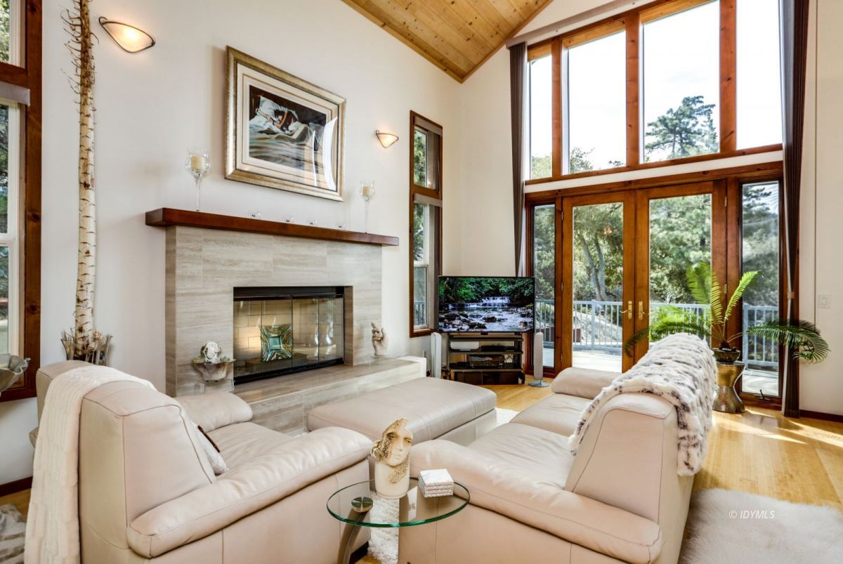 25126 Cougar Road Idyllwild, CA 92549 - Photo 3 of 63 a living room with furniture and a fireplace
