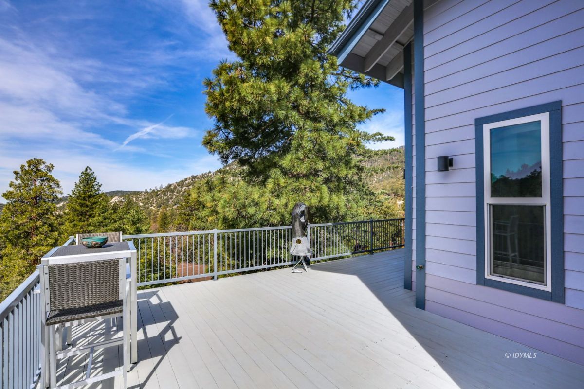 25126 Cougar Road Idyllwild, CA 92549 - Photo 42 of 63 a view of a chair and table in the balcony