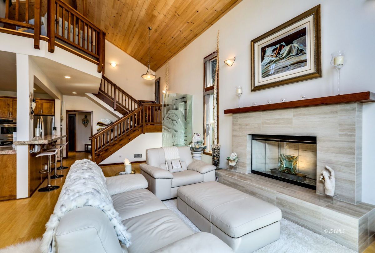 25126 Cougar Road Idyllwild, CA 92549 - Photo 5 of 63 a living room with furniture and a fireplace