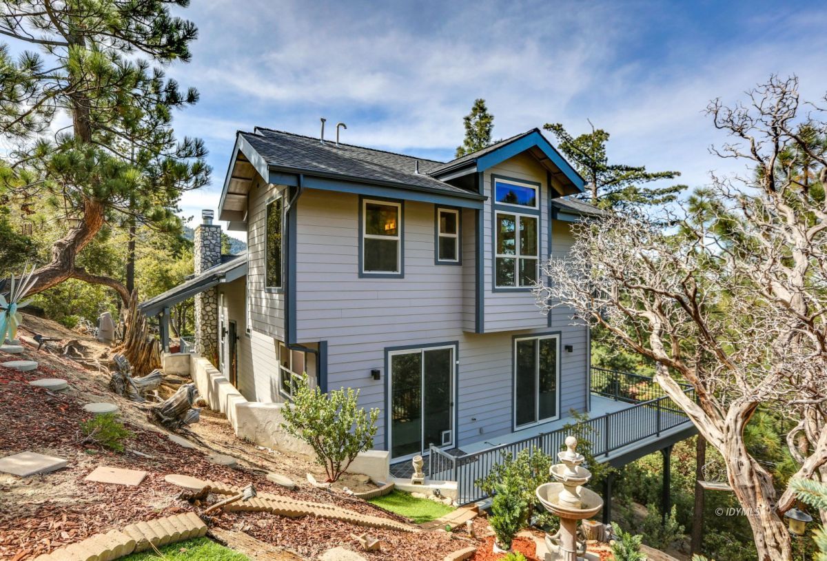 25126 Cougar Road Idyllwild, CA 92549 - Photo 54 of 63 a front view of a house with garden
