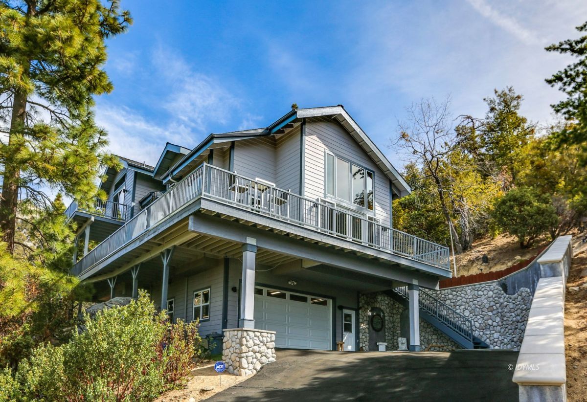25126 Cougar Road Idyllwild, CA 92549 - Photo 55 of 63 a front view of a house with garden