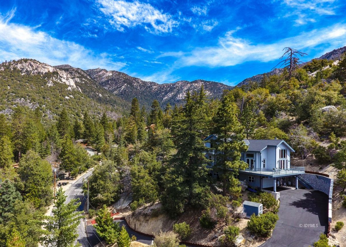 25126 Cougar Road Idyllwild, CA 92549 - Photo 59 of 63 a view of a house with a yard
