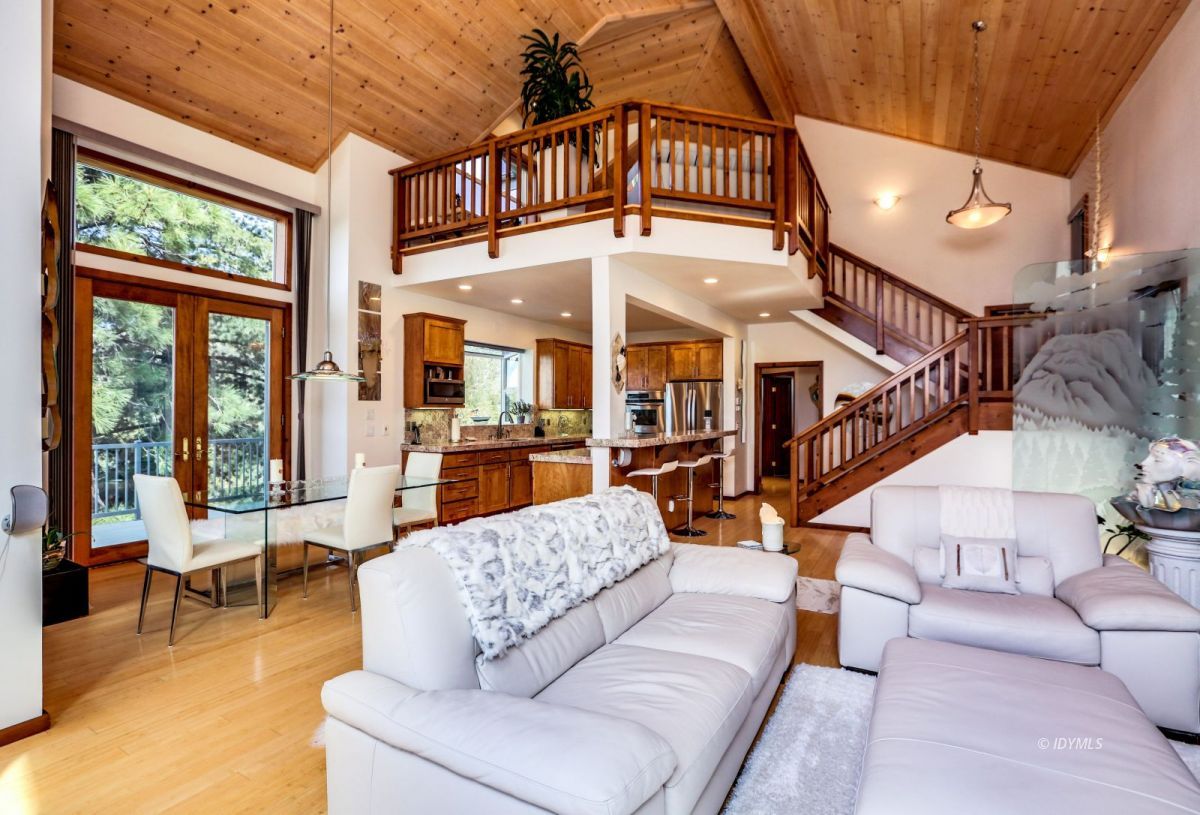 25126 Cougar Road Idyllwild, CA 92549 - Photo 6 of 63 a living room with furniture and a chandelier