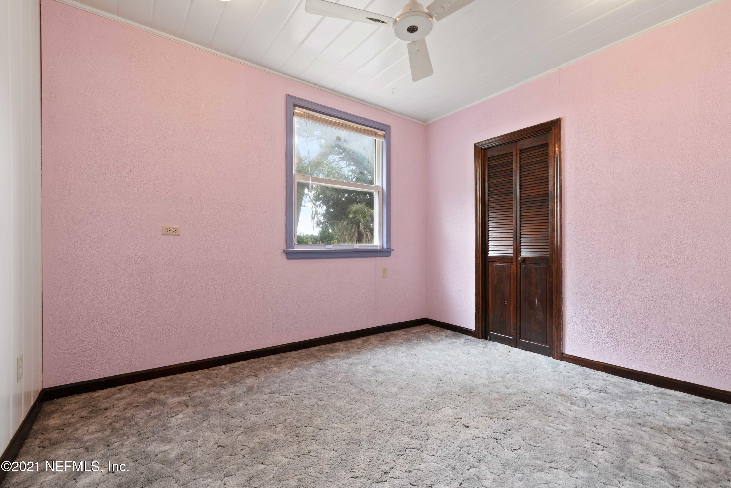 1624 Mayfair Road Jacksonville, FL 32207 - Photo 13 of 23 an empty room with windows