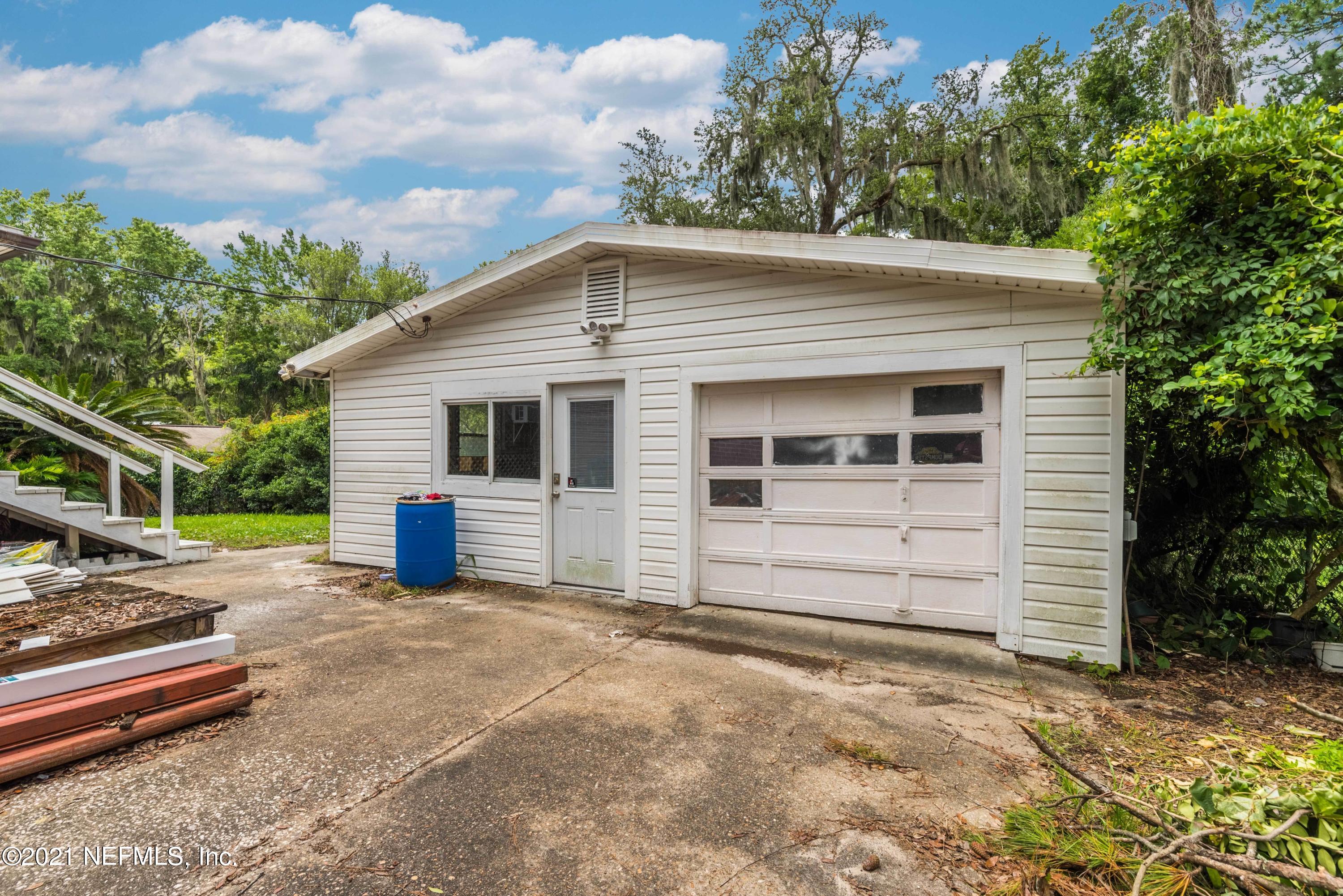 1624 Mayfair Road Jacksonville, FL 32207 - Photo 22 of 23 a view of a house with a backyard