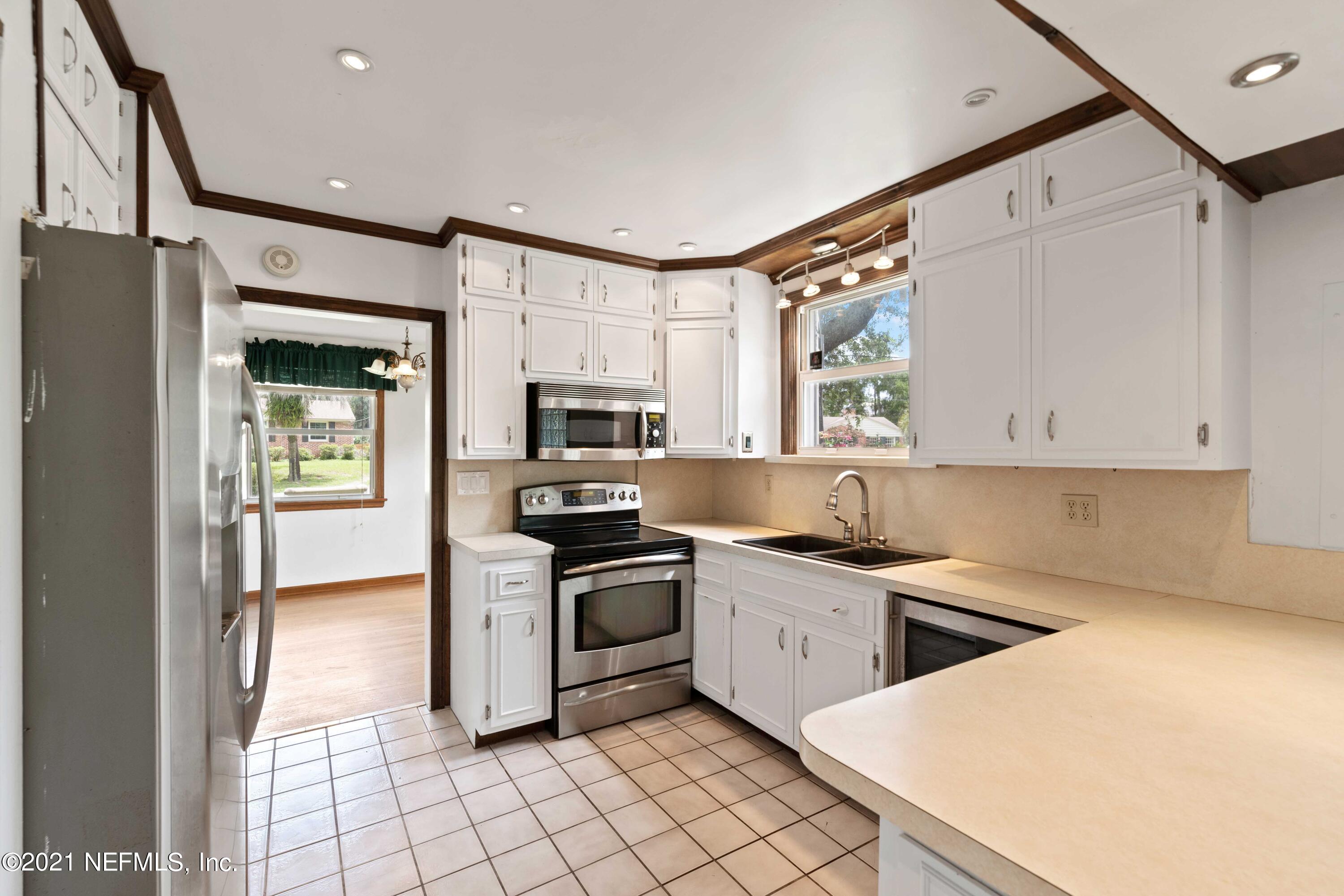 1624 Mayfair Road Jacksonville, FL 32207 - Photo 8 of 23 a kitchen with a sink appliances and cabinets