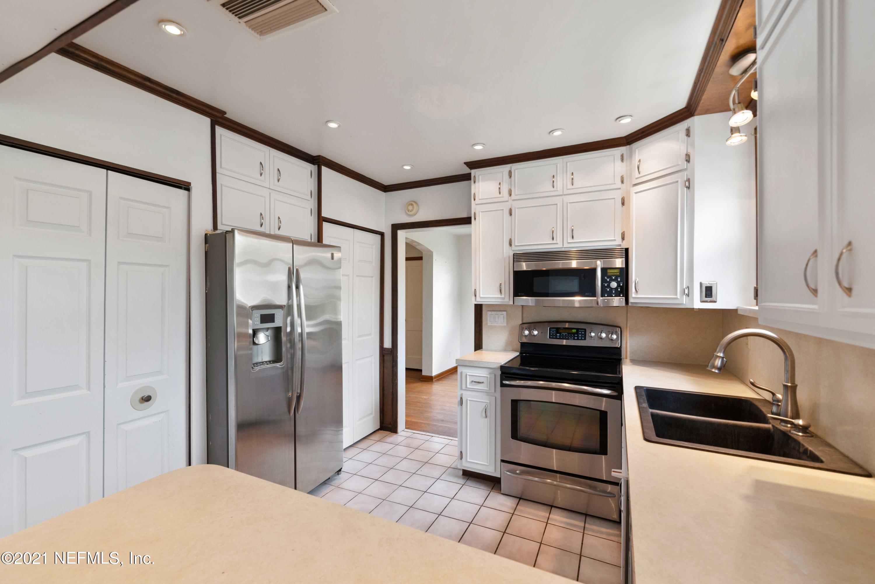 1624 Mayfair Road Jacksonville, FL 32207 - Photo 9 of 23 a kitchen with stainless steel appliances granite countertop a refrigerator and a sink