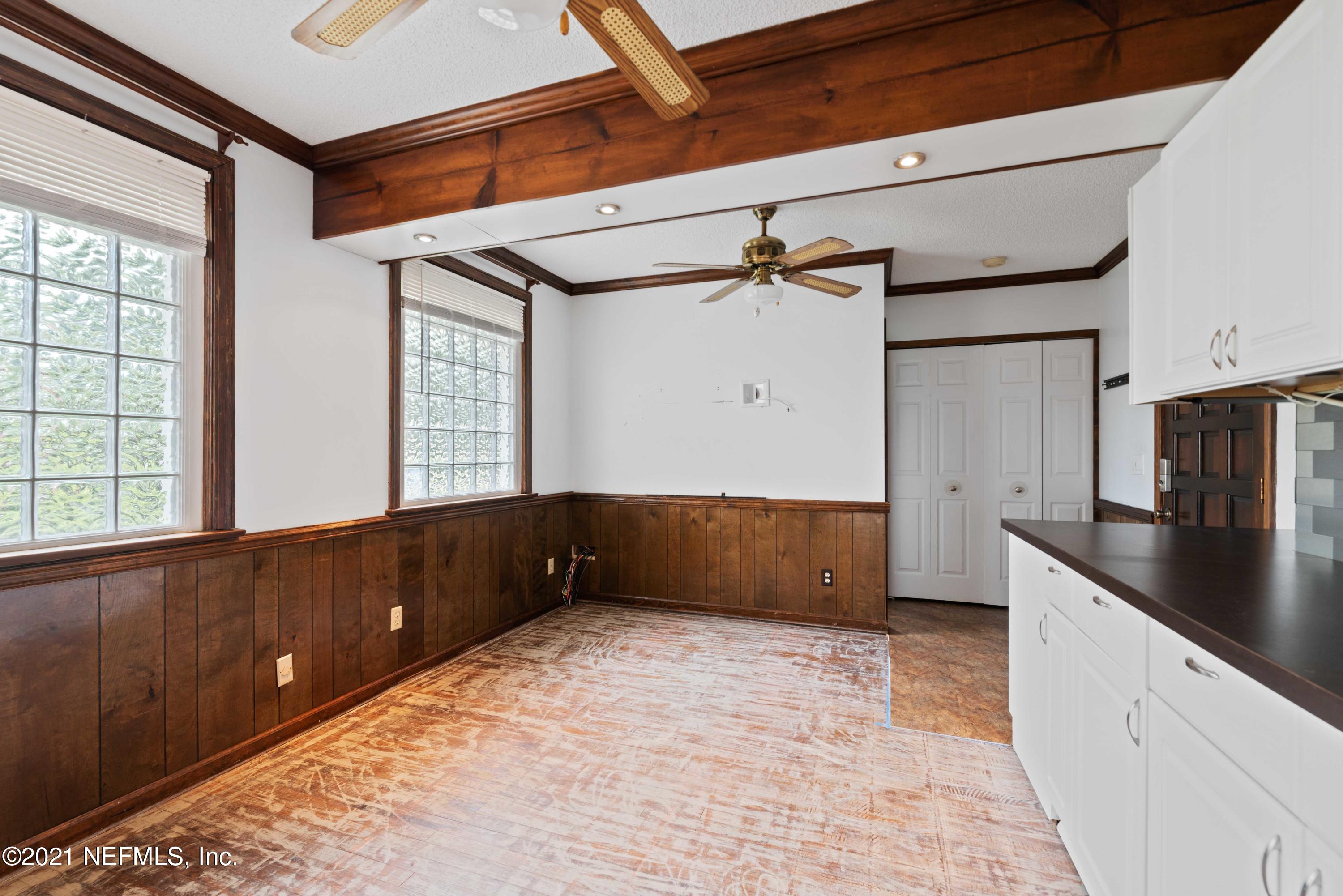 1624 Mayfair Road Jacksonville, FL 32207 - Photo 10 of 23 a kitchen with granite countertop a refrigerator and a sink