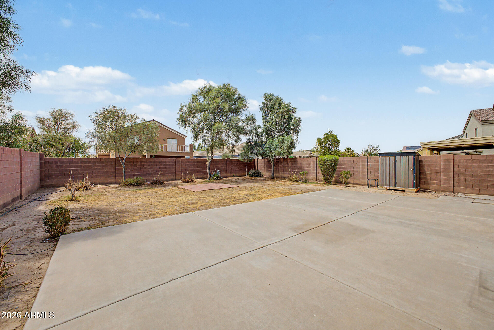 8337 West Payson Road Tolleson, AZ 85353 - Photo 40 of 44 Patio and small metal tool shed
