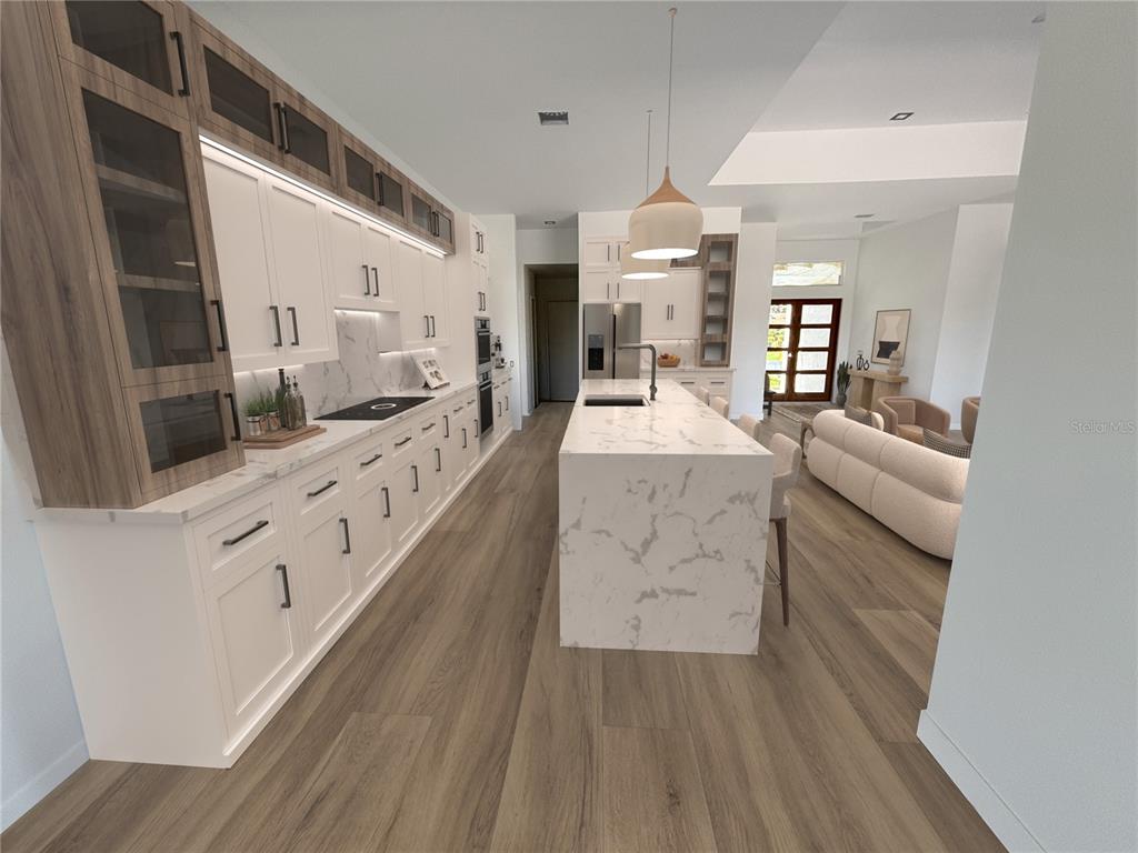 215 Bunker Road Rotonda West, FL 33947 - Photo 12 of 46 a large white kitchen with a large window