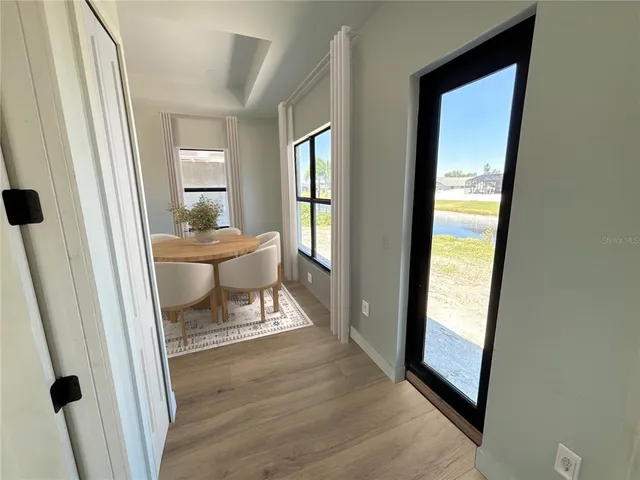 a hallway with a wooden floor