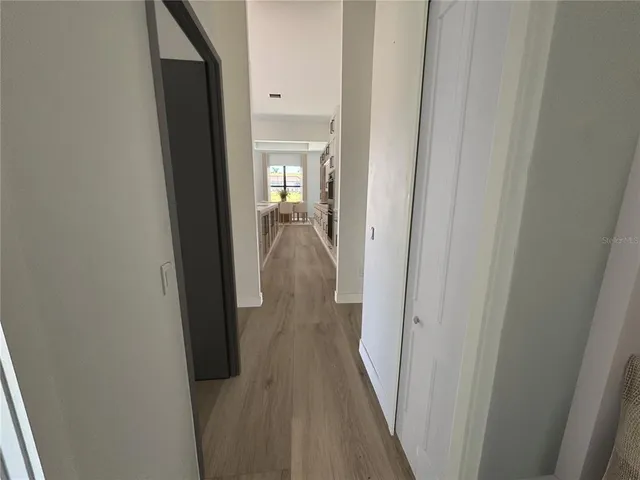 a bedroom with bed and a window