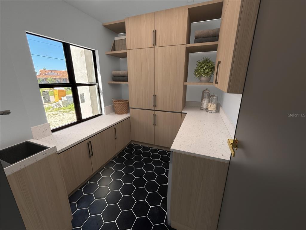 215 Bunker Road Rotonda West, FL 33947 - Photo 22 of 46 a kitchen with a refrigerator and a window