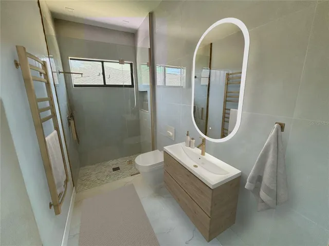 a bathroom with a bathtub and window