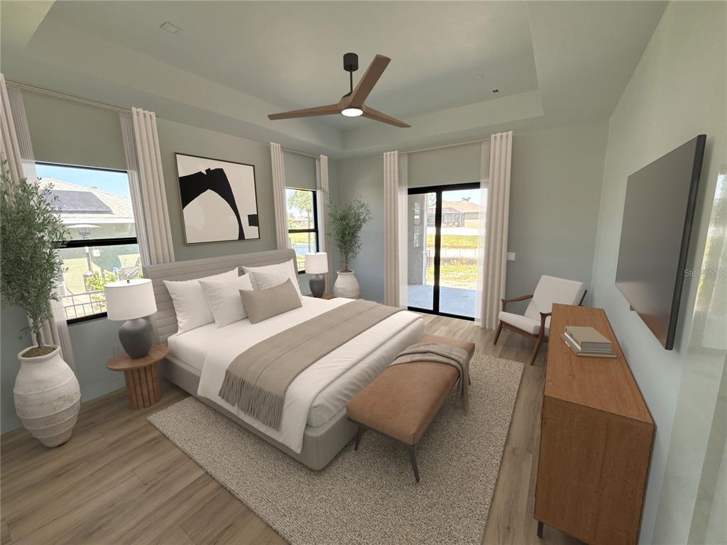 215 Bunker Road Rotonda West, FL 33947 - Photo 28 of 46 a bedroom with bed and a large window