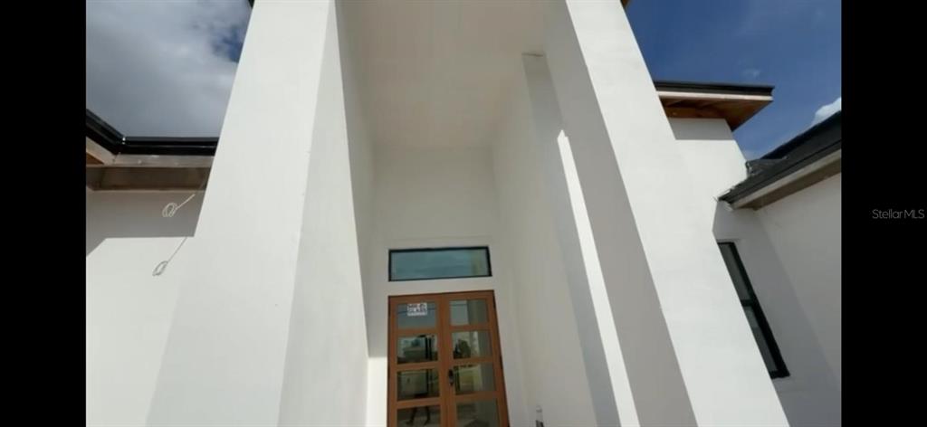 215 Bunker Road Rotonda West, FL 33947 - Photo 3 of 46 a view of stairs