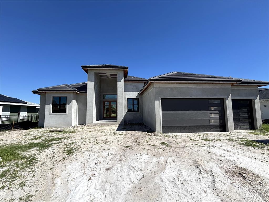 215 Bunker Road Rotonda West, FL 33947 - Photo 4 of 46 a view of a house with a outdoor space