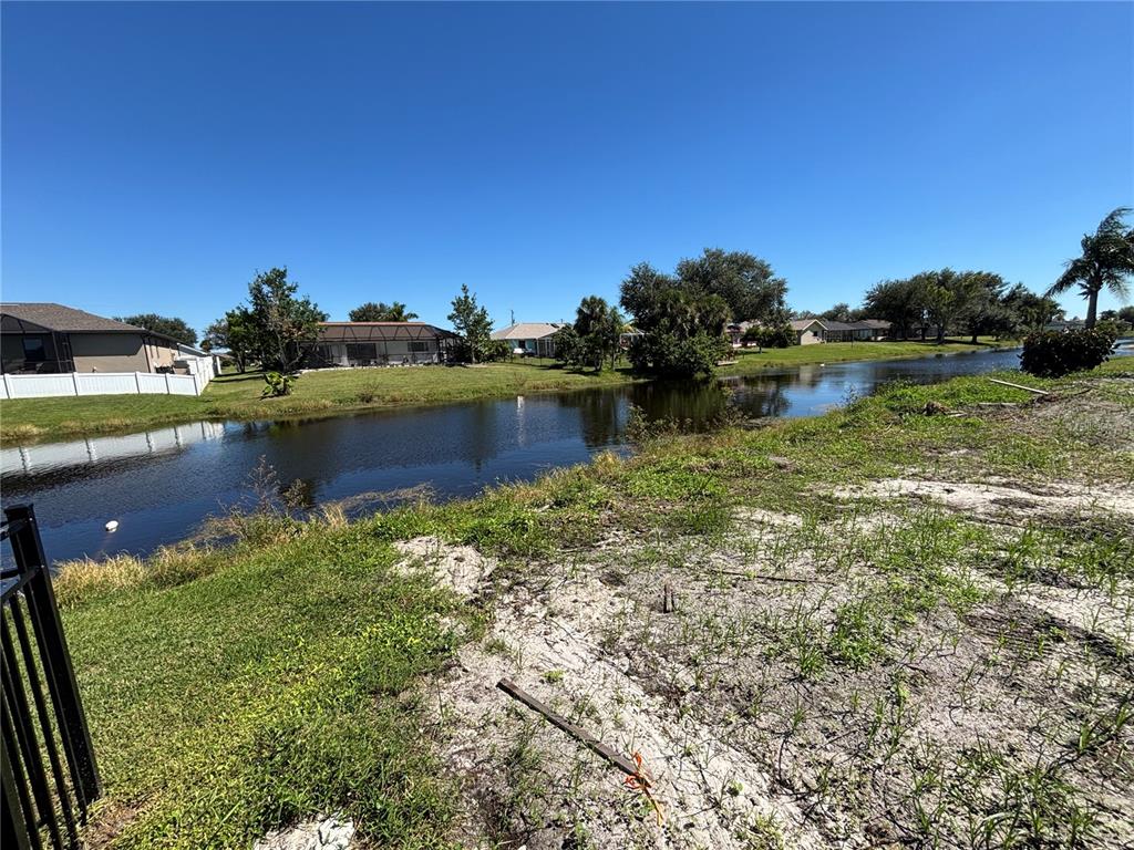 215 Bunker Road Rotonda West, FL 33947 - Photo 46 of 46 a view of a lake with houses