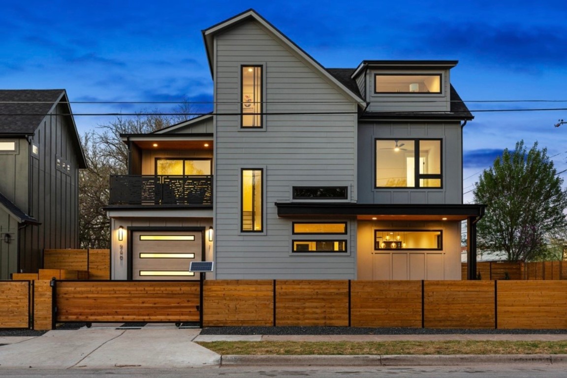 a front view of a house with garage