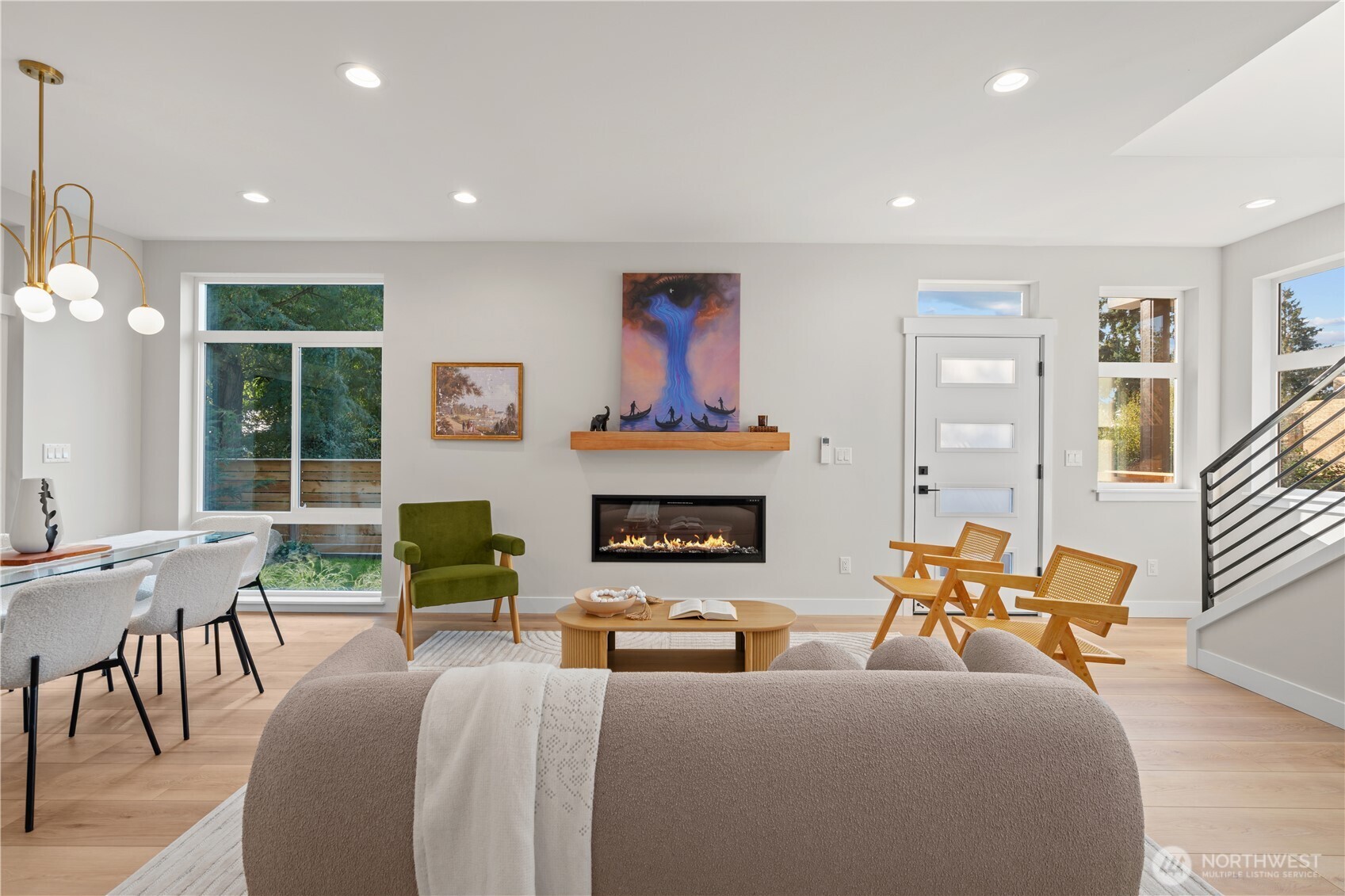 9230 22nd Avenue Southwest Seattle, WA 98106 - Photo 3 of 26 a living room with furniture and a fireplace
