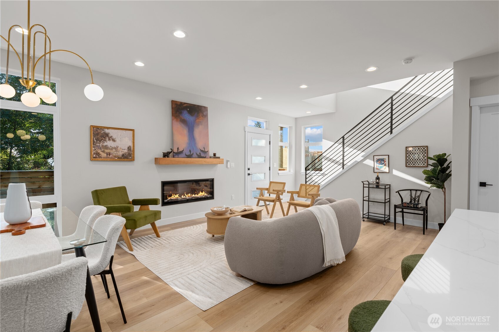 9230 22nd Avenue Southwest Seattle, WA 98106 - Photo 4 of 26 a living room with furniture potted plant and a fireplace