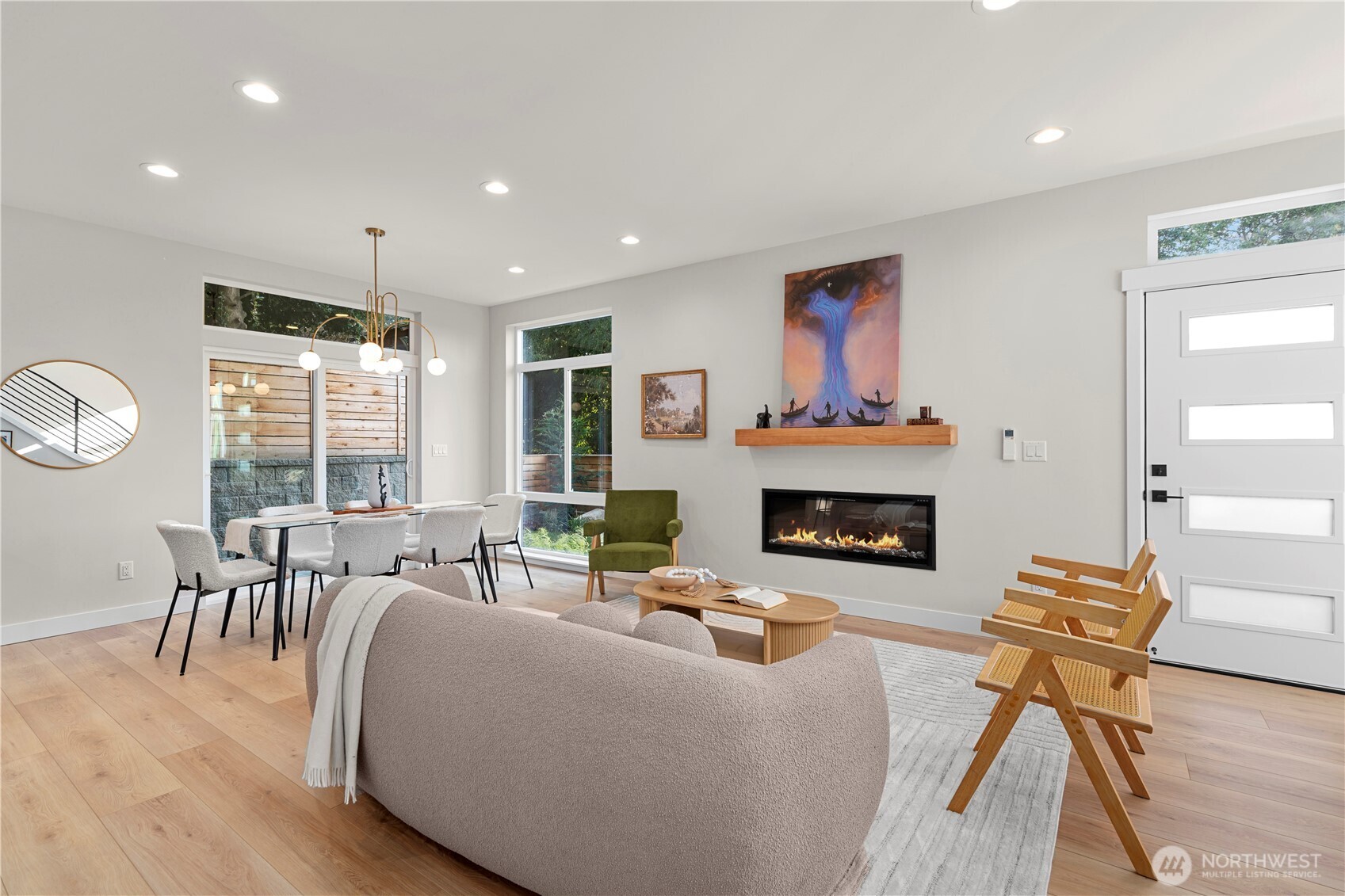 9230 22nd Avenue Southwest Seattle, WA 98106 - Photo 5 of 26 a living room with furniture a fireplace and a table