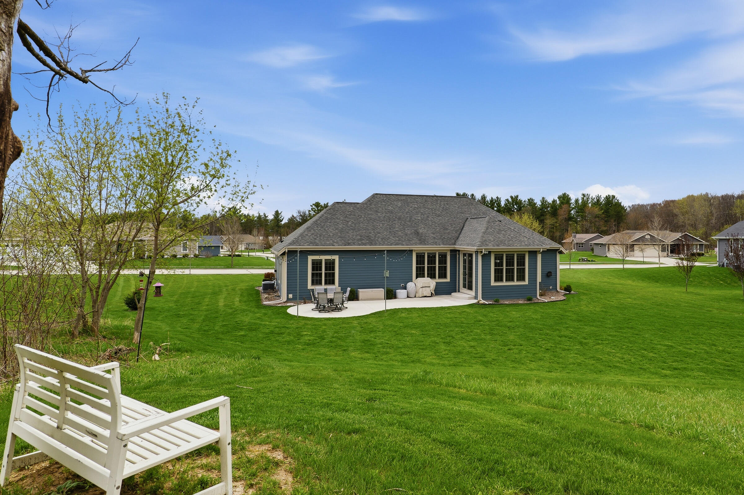 718 Meadow Ridge Lane Plymouth, WI 53073 - Photo 11 of 44 Back of House and Yard