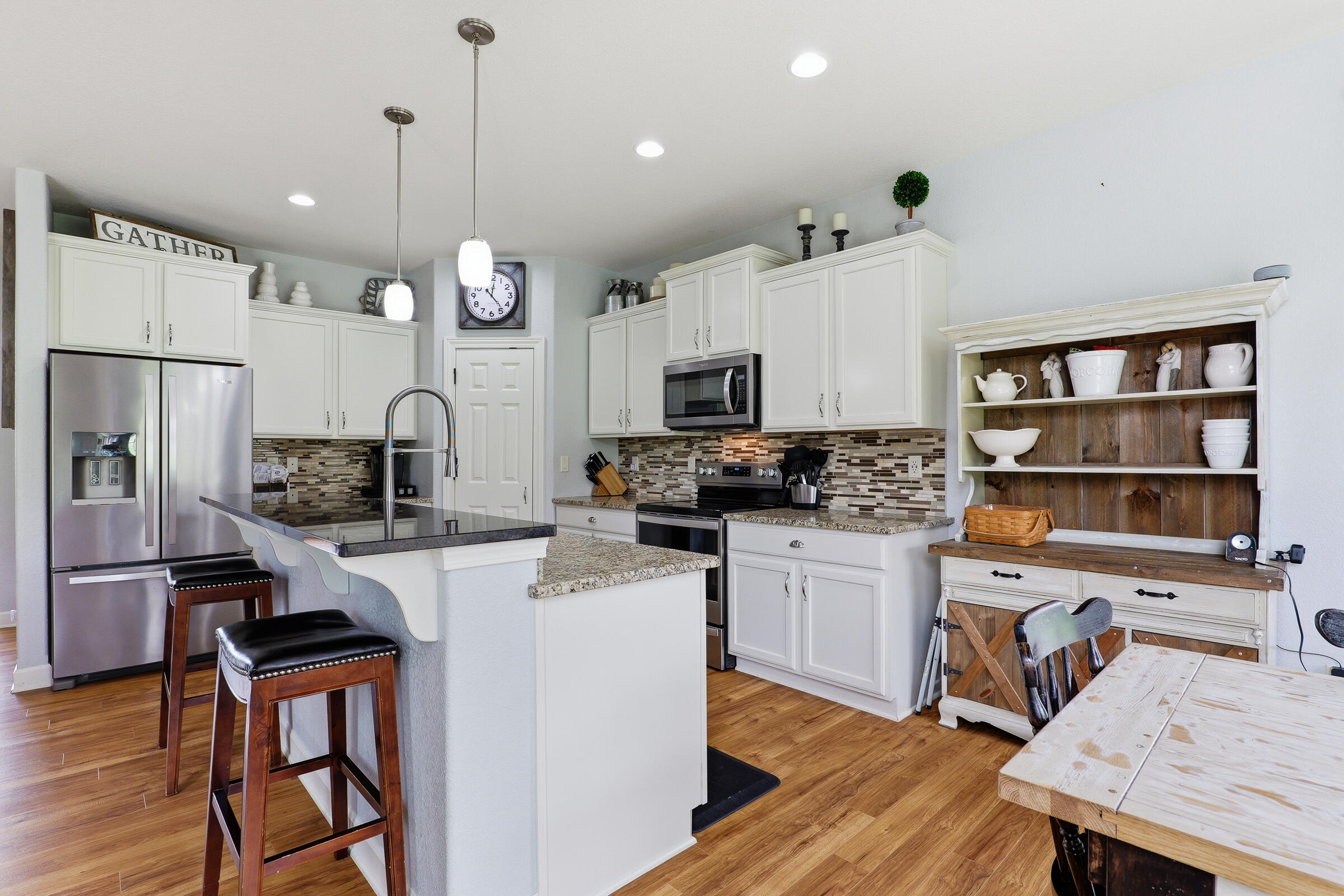 718 Meadow Ridge Lane Plymouth, WI 53073 - Photo 14 of 44 Breakfast Bar Seating