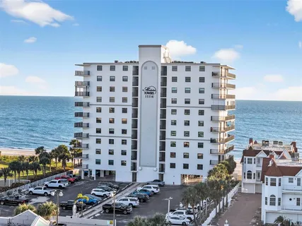 a view of swimming pool with a terrace and city view