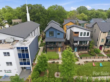an aerial view of a house with a garden