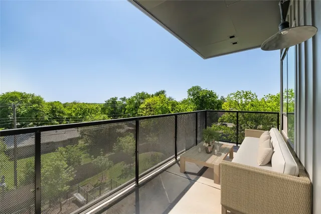 a view of a balcony with couches