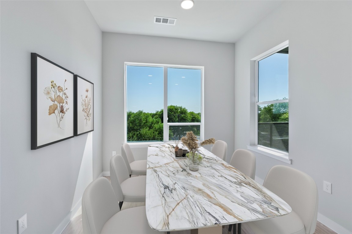 4510 Terry-O Lane, Unit 345 Austin, TX 78745 - Photo 5 of 15 a living room with furniture large window and wooden floor