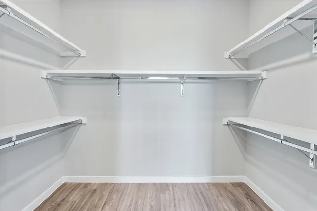 a view of a room with racks on the wall