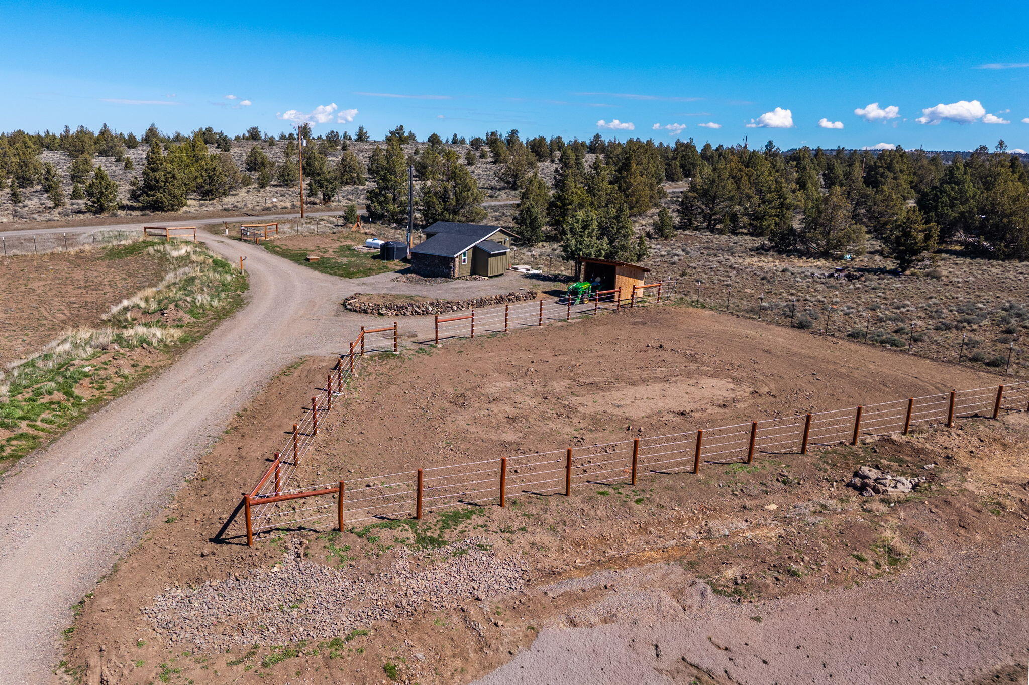 6040 Gravett Road Prineville, OR 97754 - Photo 67 of 77 a view of a backyard with sitting area