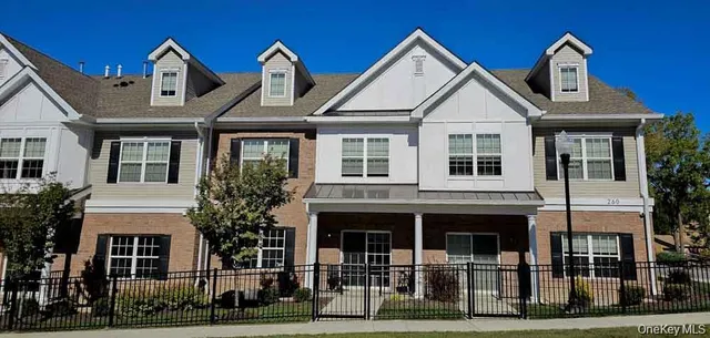 a front view of a house with a porch