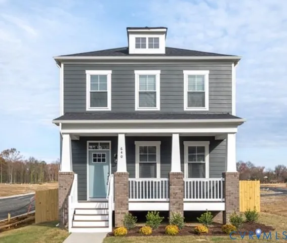 a front view of a house with a porch