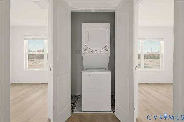 a view of a storage & utility room with a sink