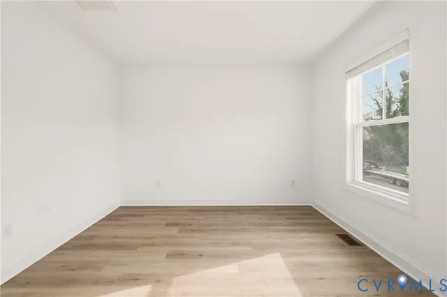 a view of a room that has a window