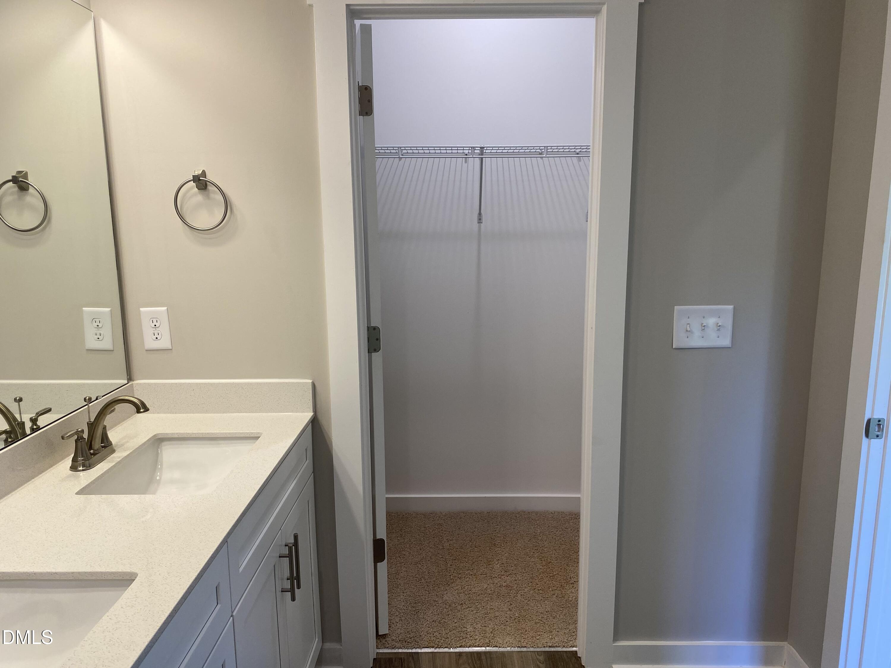2827 Ricolden Trail Elon, NC 27244 - Photo 20 of 30 a bathroom with a sink and mirror