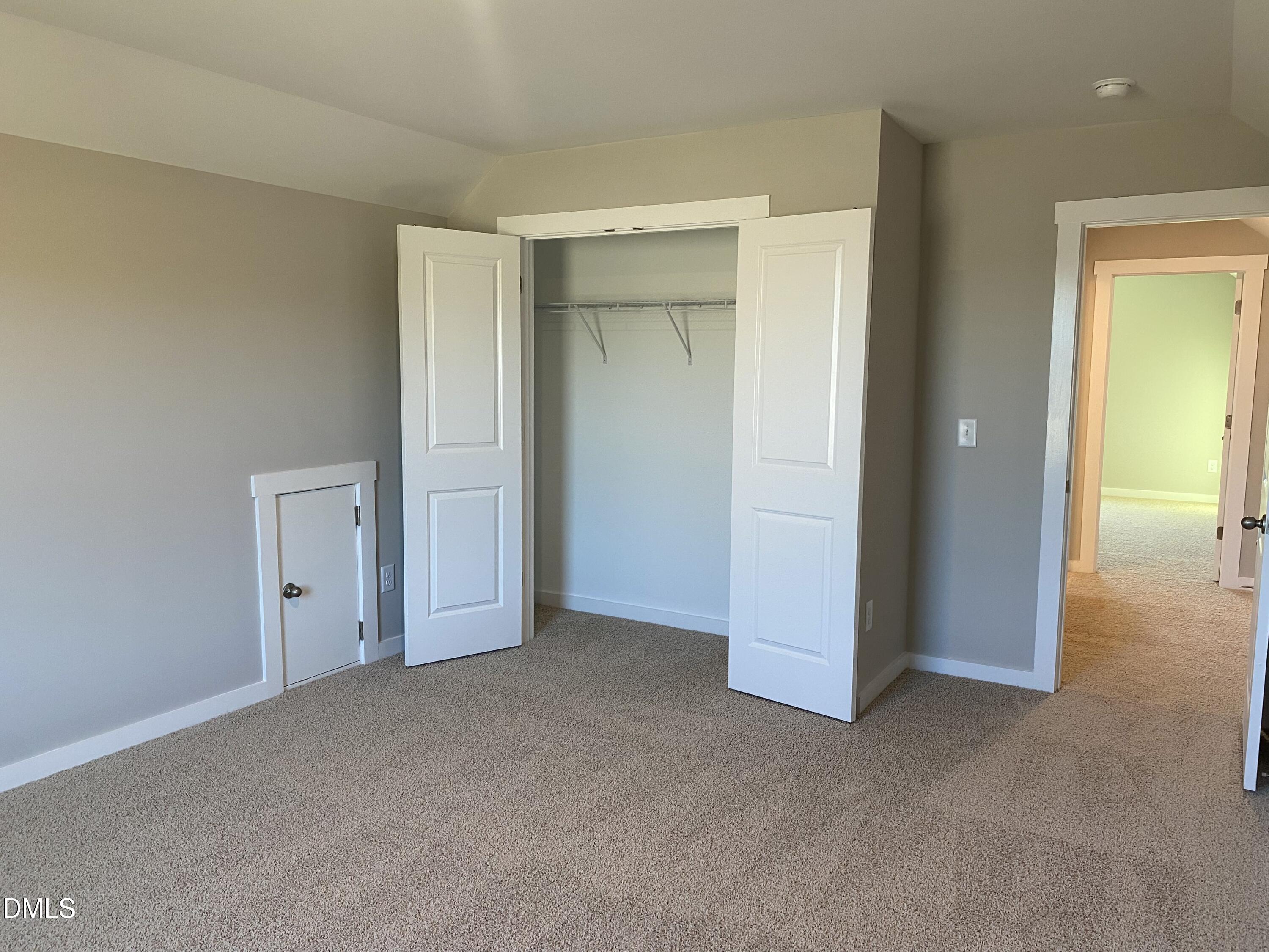2827 Ricolden Trail Elon, NC 27244 - Photo 24 of 30 an empty room with closet area