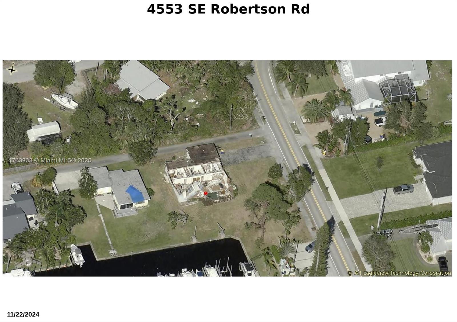 4553 Southeast Robertson Road Stuart, FL 34997 - Photo 1 of 1 a black and white photo of a tennis court
