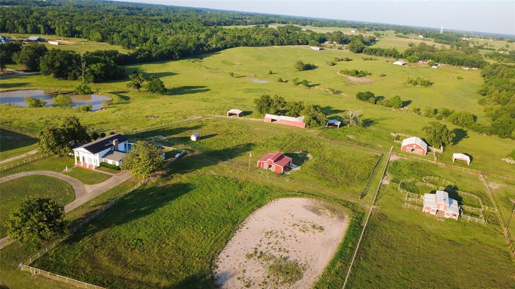 7359 Highway 154 Sulphur Springs, TX 75482 - Photo 4 of 40 View of pond, house and outbuildings