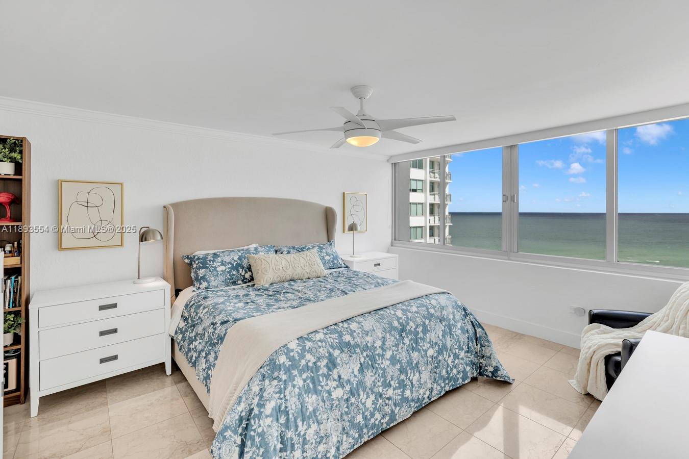 7135 Collins Avenue, Unit 1126 Miami Beach, FL 33141 - Photo 18 of 45 a bedroom with a bed and a window