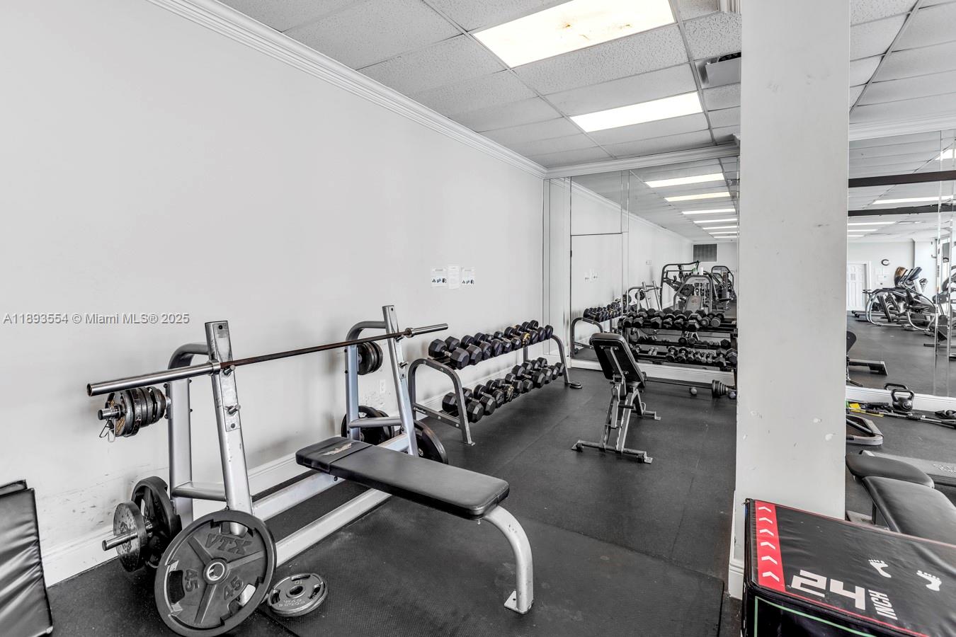 7135 Collins Avenue, Unit 1126 Miami Beach, FL 33141 - Photo 31 of 45 a view of a room with gym equipment