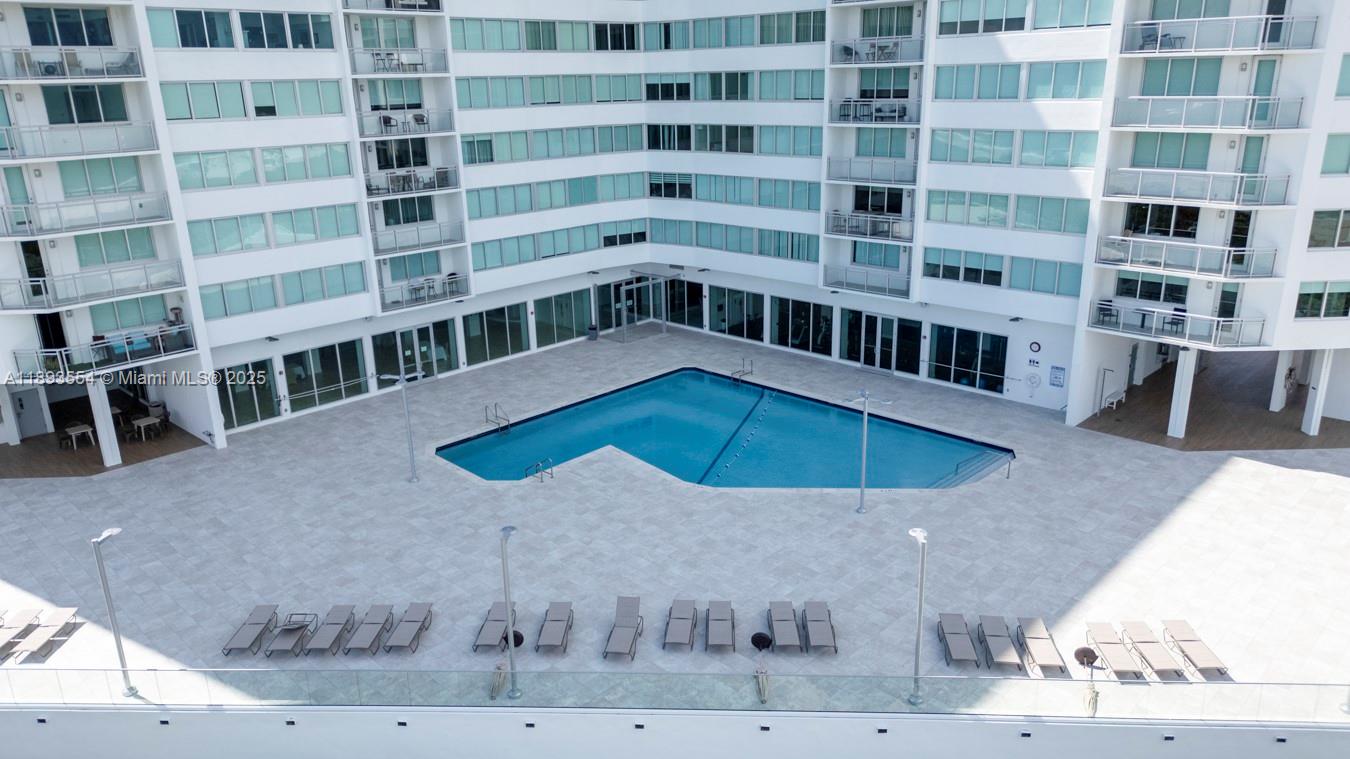 7135 Collins Avenue, Unit 1126 Miami Beach, FL 33141 - Photo 33 of 45 a view of a balcony with an outdoor space