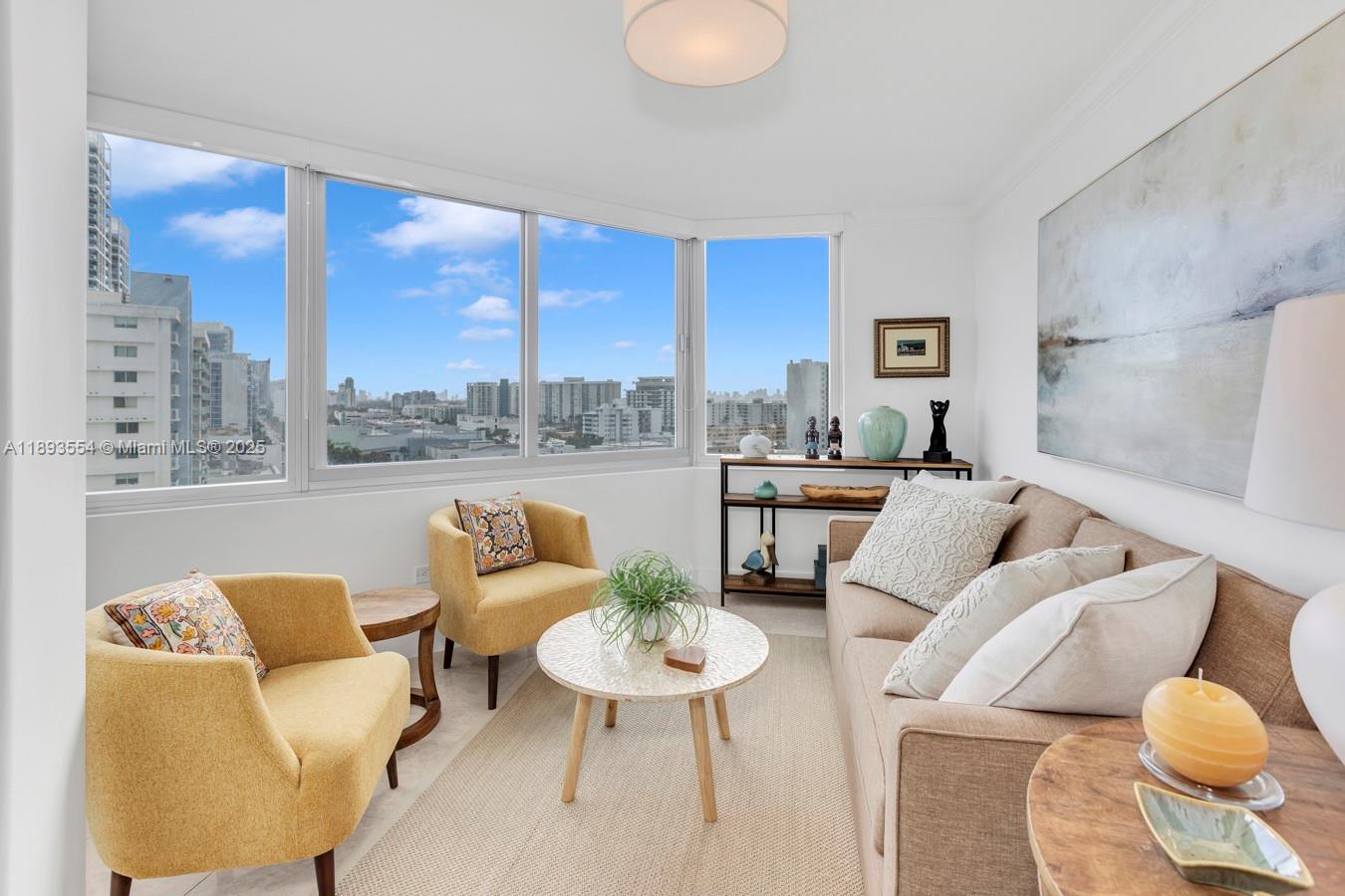 7135 Collins Avenue, Unit 1126 Miami Beach, FL 33141 - Photo 6 of 45 a living room with furniture and a large window
