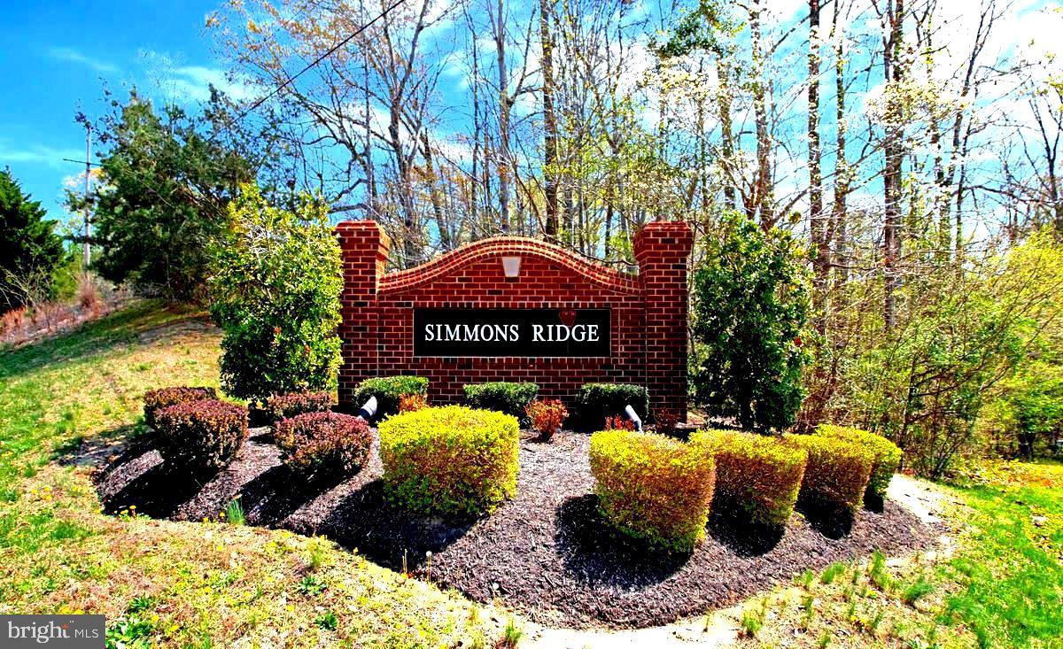 54 Simmons Ridge Road Prince Frederick, MD 20678 - Photo 54 of 55 a view of outdoor space with garden and trees